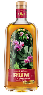 A clear glass rum bottle displays a botanical label with pink orchids and green leaves; amber liquid fills the bottle against a white background.