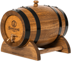 Wooden rum barrel rests on a curved wooden stand, bound by black metal hoops, topped with a wooden bung and fitted with a brass spigot, shown on a plain background.
