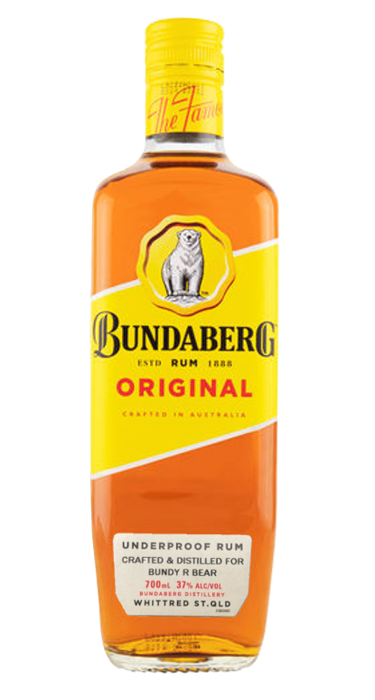 Glass bottle of Bundaberg Original rum stands upright against a plain white background; amber liquid visible, yellow diagonal label with polar bear logo and red "ORIGINAL" band.