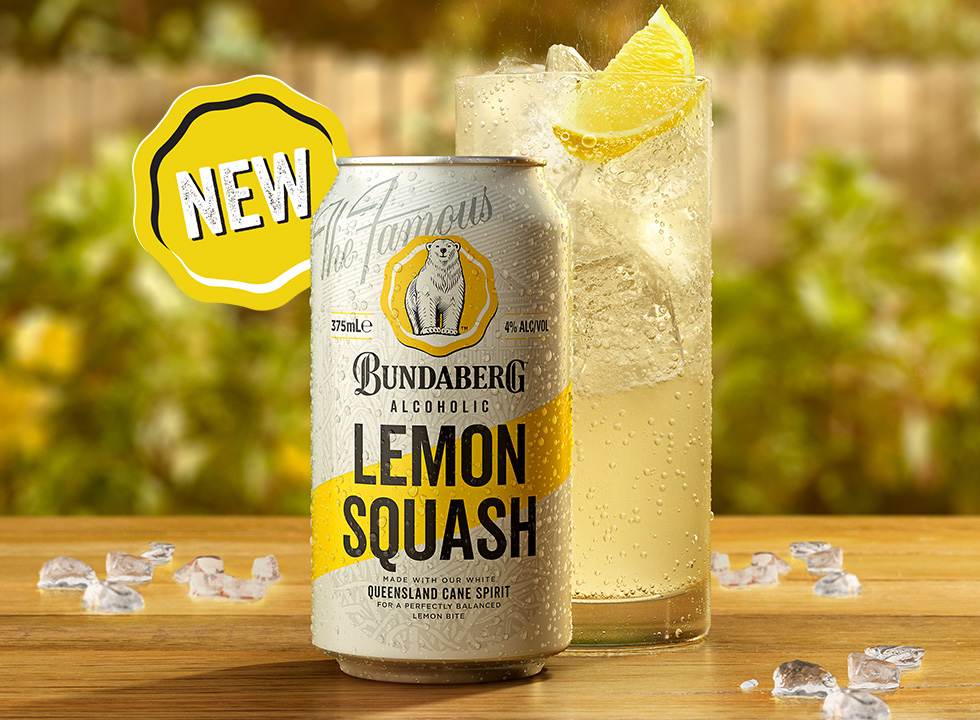 Alcoholic lemon squash can poured in a glass